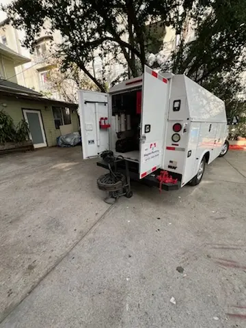 Magnet Plumbing service vehicle on-site for Water Heater Repair in Hollywood by the Lake